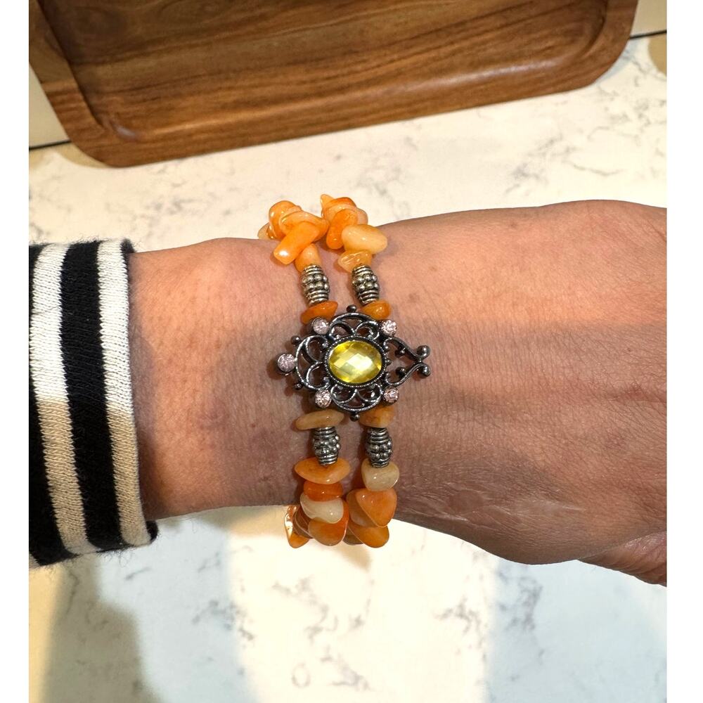 Handmade peach aventurine orange jade beaded ornate dark metal accent bracelet